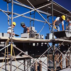 Contrators on a scaffold