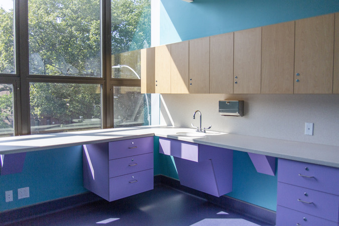 The third floor of the Floating Hospital's flagship clinic features exam rooms, offices, a laboratory, pantry, storage rooms, and a locker room. 